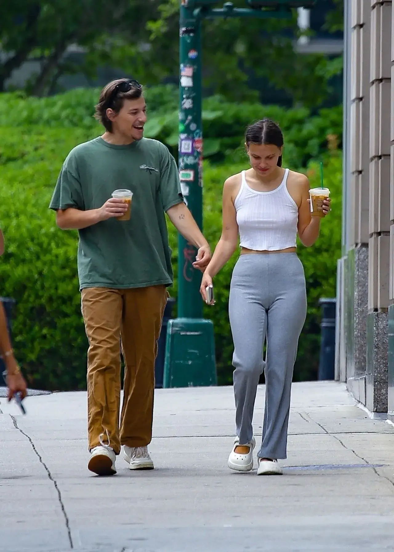 Millie Bobby Brown Stills in White Top Blue jeans in New York